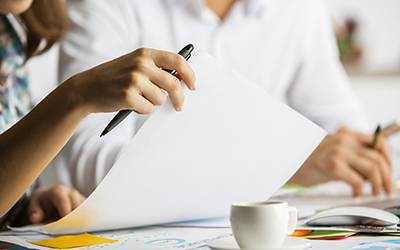 People looking through paperwork