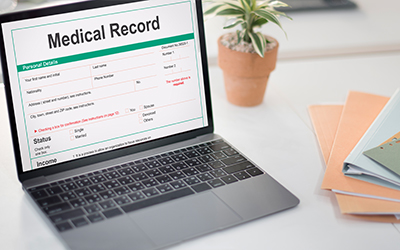 A medical report record form on a computer screen