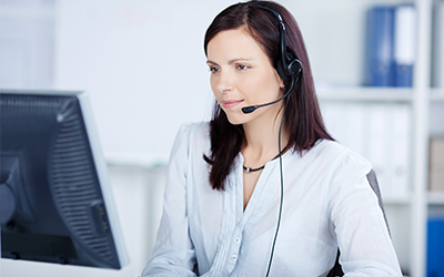 A business woman working on a computer